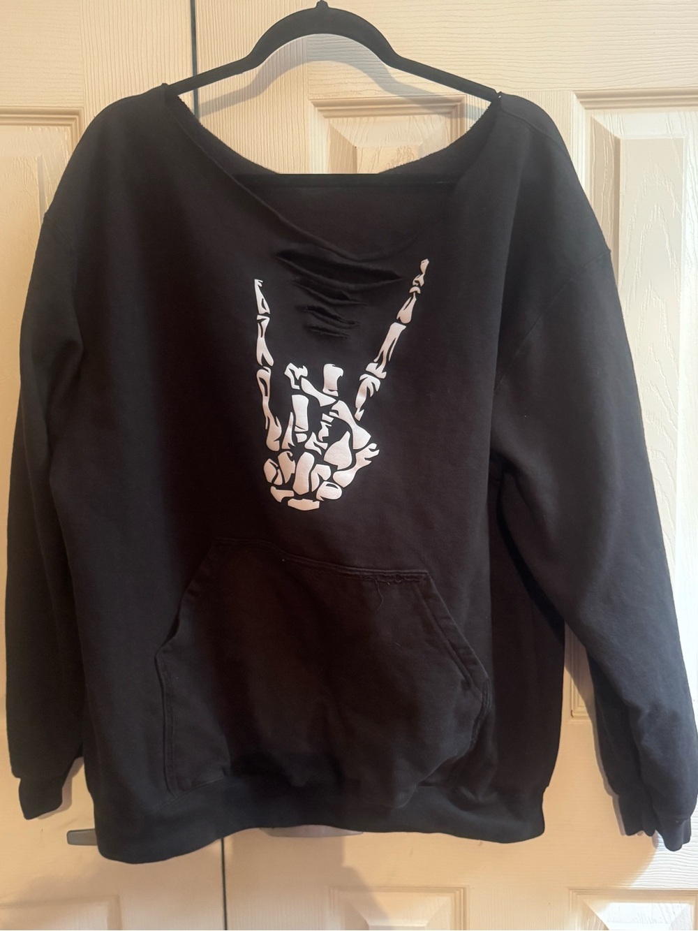 Black Women's Sweatshirt with White Skeleton Hand Graphic